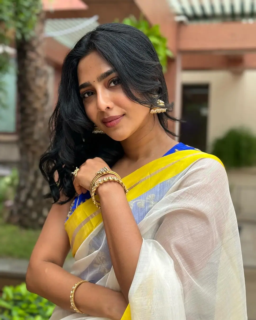 Aishwarya Lekshmi Wearing White Saree Blue Sleeveless Blouse